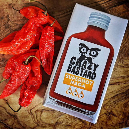 Super hot Naga fermented chilli sauce, handcrafted in the UK, perfect for adding intense heat and depth to curries, stews, and spicy dishes.