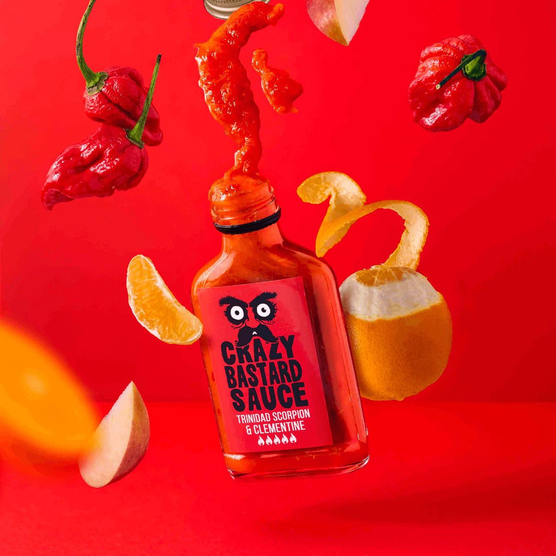 Trinidad Scorpion Clementine Hot Chilli Sauce. Vegan and gluten-free artisan sauce crafted in the UK.